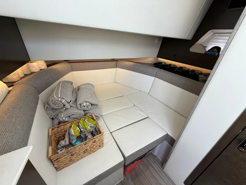 Slide: The Image of Interior of 2020 Cruisers Yachts 38 GLS OB with cozy seating and amenities. - 21
