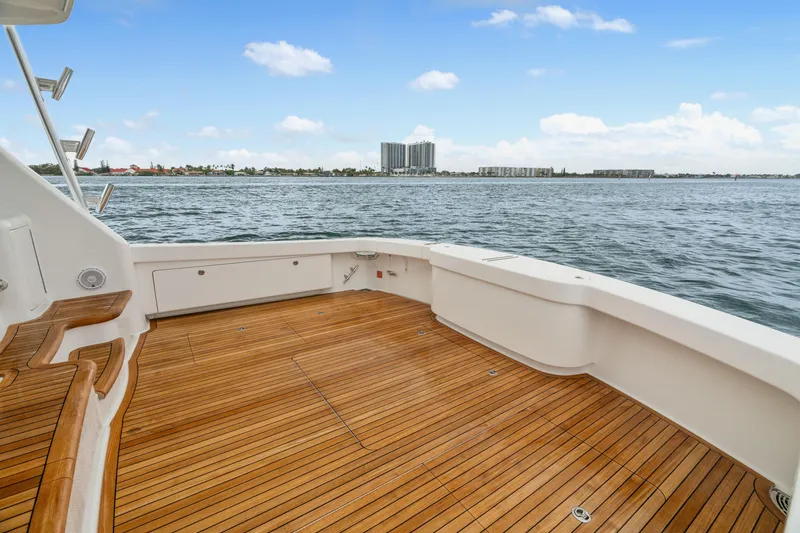 Slide: The Image of Spacious deck of 2025 Viking 58 Convertible yacht with ocean view. - 29