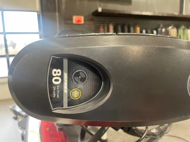 Slide: The Image of 2019 Skeeter ZX190 boat motor, 80 lb thrust, 24 volts, in a garage setting. - 6