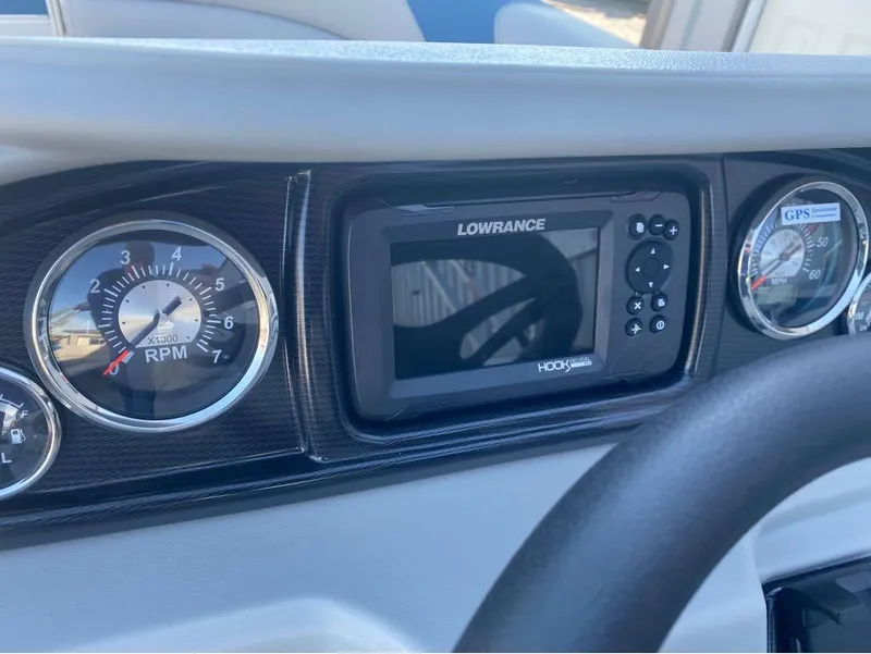 Slide: The Image of Dashboard of 2024 Trifecta 22CL2 LE with Lowrance GPS and RPM gauge. - 11