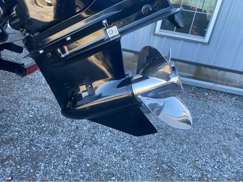 Slide: The Image of 2024 Trifecta 22CL2 LE boat propeller on gravel surface. - 18