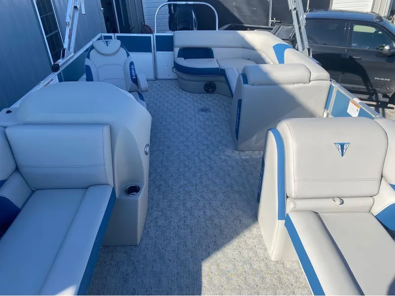 Slide: The Image of 2024 Trifecta 22CL2 LE pontoon boat interior with gray and blue seating. - 3