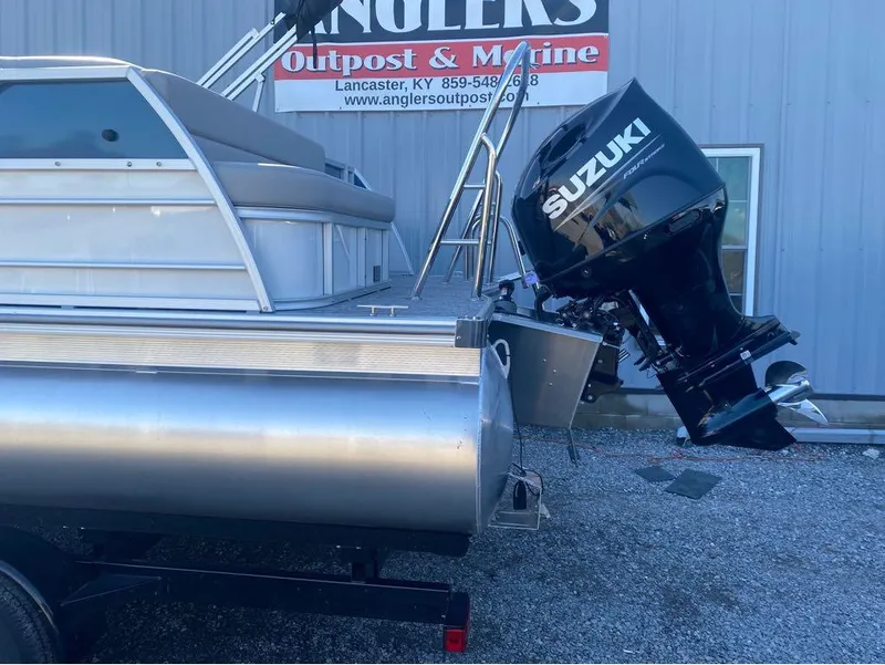 Slide: The Image of 2024 Trifecta 22CL2 LE pontoon boat with Suzuki outboard motor at Anglers Outpost & Marine. - 6