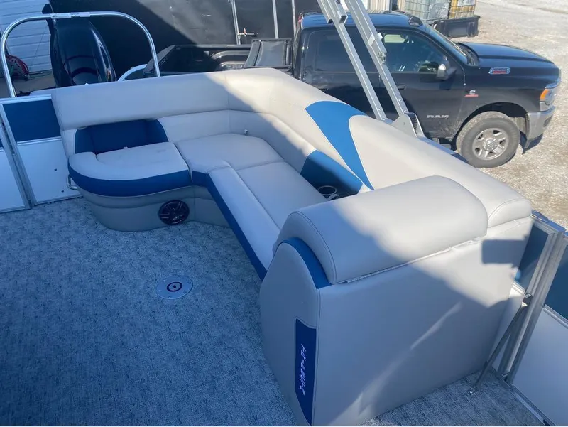 Slide: The Image of 2024 Trifecta 22CL2 LE pontoon boat with spacious seating and modern design. - 7