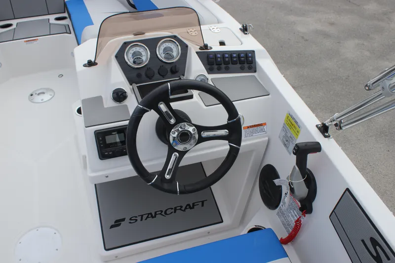 Slide: The Image of Steering console of 2025 Starcraft SV 16 OB boat with modern controls and dashboard. - 11