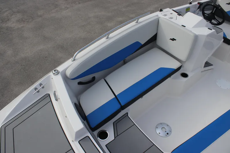 Slide: The Image of 2025 Starcraft SV 16 OB boat interior with blue and white seating. - 6