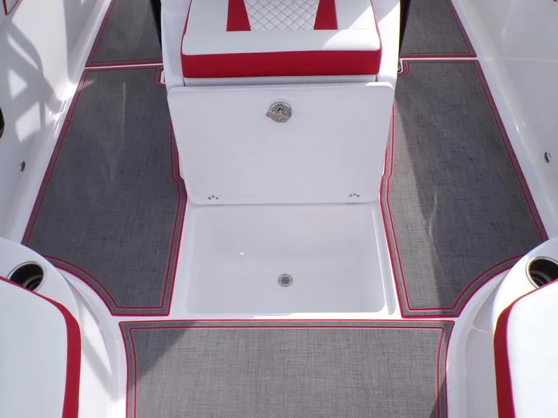 Slide: The Image of Interior of 2026 Statement 250 CC boat with red and gray seating and flooring. - 9