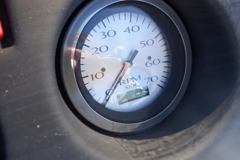 Slide: The Image of Tachometer of 2022 Bennington SX 22 Swingback showing RPM levels. - 12