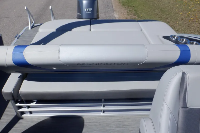 Slide: The Image of 2022 Bennington SX 22 Swingback boat with gray seating and cup holders. - 25