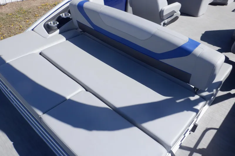 Slide: The Image of 2022 Bennington SX 22 Swingback boat with gray seating and cup holders. - 29