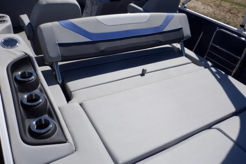 Slide: The Image of 2022 Bennington SX 22 Swingback boat interior with cushioned seating and cup holders. - 34