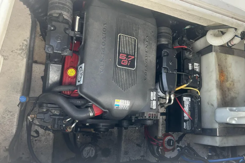 Slide: The Image of Engine compartment of a 2004 Monterey 253 Explorer Sport boat. - 11