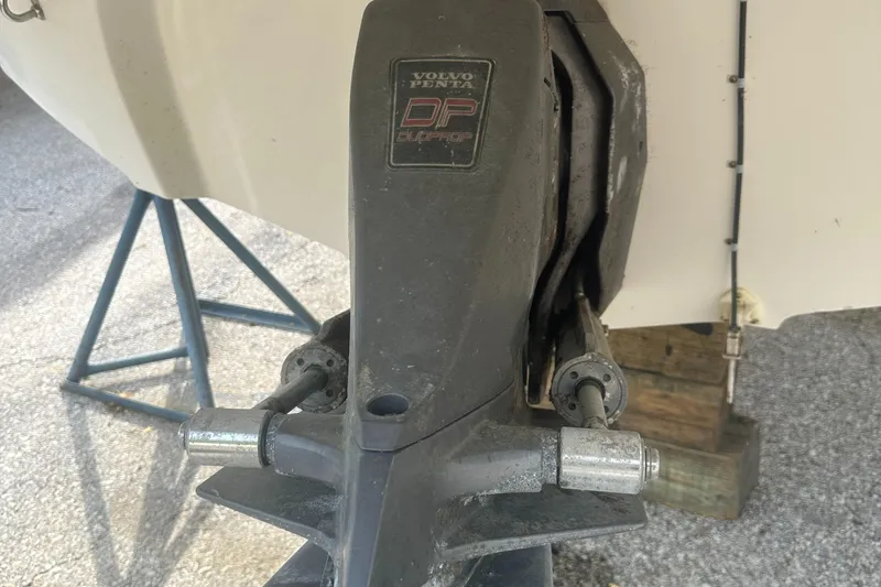 Slide: The Image of Volvo Penta outdrive on 2004 Monterey 253 Explorer Sport boat, displayed on a stand. - 14