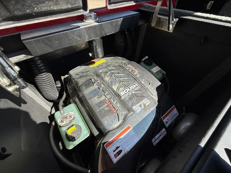 Slide: The Image of 2021 Supra SL engine compartment with Roush components, showcasing performance features. - 17