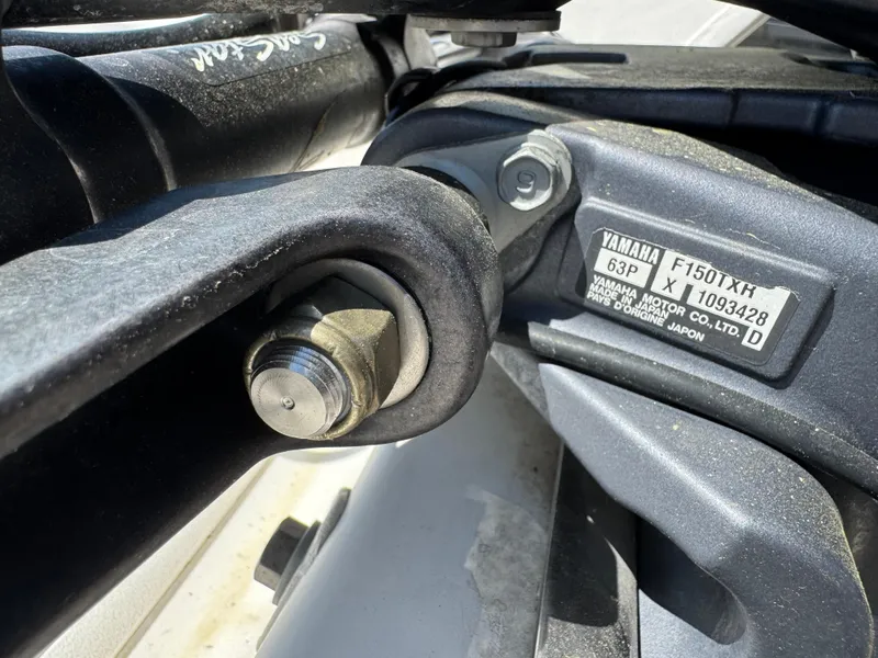 Slide: The Image of Close-up of a Yamaha motor part on a 2010 Carolina Skiff 218 DLV Elite boat. - 4
