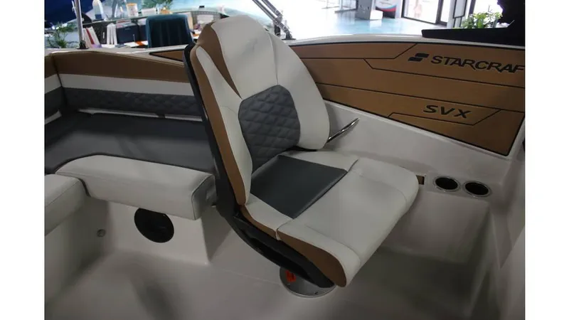 Slide: The Image of 2025 Starcraft SVX 190 OB DC boat interior with cushioned seating and modern design. - 3