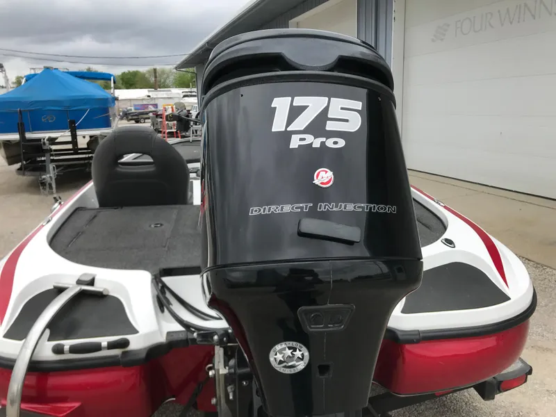 Slide: The Image of 2017 Nitro Z18 boat with 175 Pro Direct Injection engine, parked outdoors. - 11