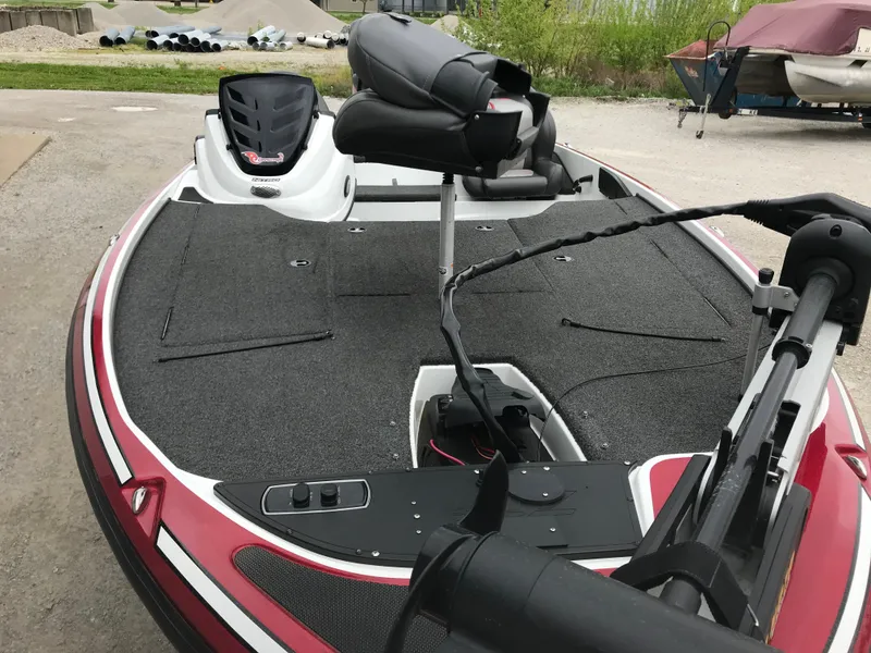Slide: The Image of 2017 Nitro Z18 bass boat with red and white detailing, featuring a spacious deck and seating. - 25