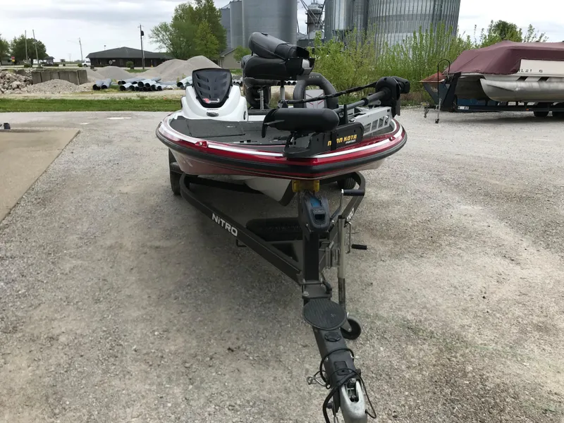 Slide: The Image of 2017 Nitro Z18 boat on trailer in outdoor storage area. - 27