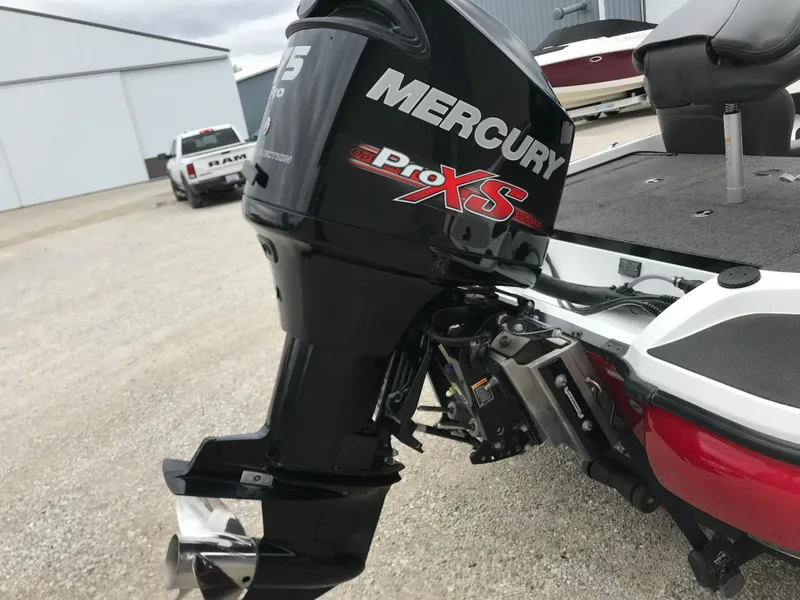 Slide: The Image of Mercury Pro XS engine on 2017 Nitro Z18 boat, parked outdoors. - 4