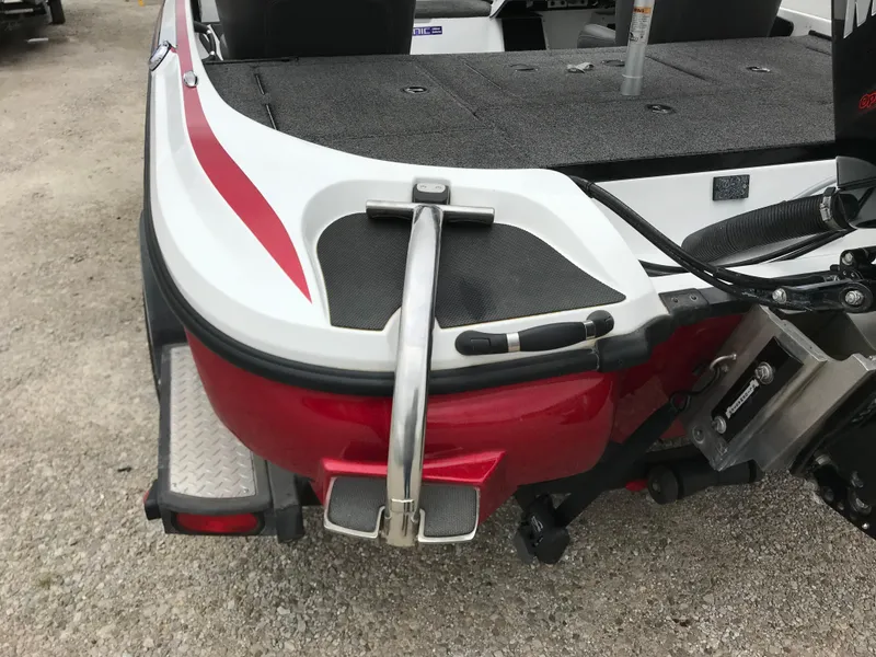 Slide: The Image of Rear view of a 2017 Nitro Z18 boat with red and white detailing. - 5