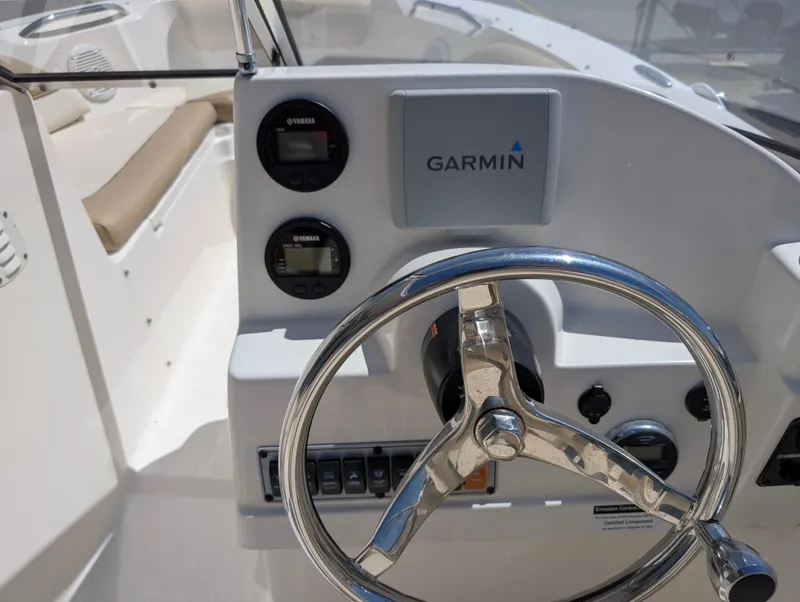 Slide: The Image of Steering console of 2017 Key West 203 DFS boat with Garmin navigation system. - 13