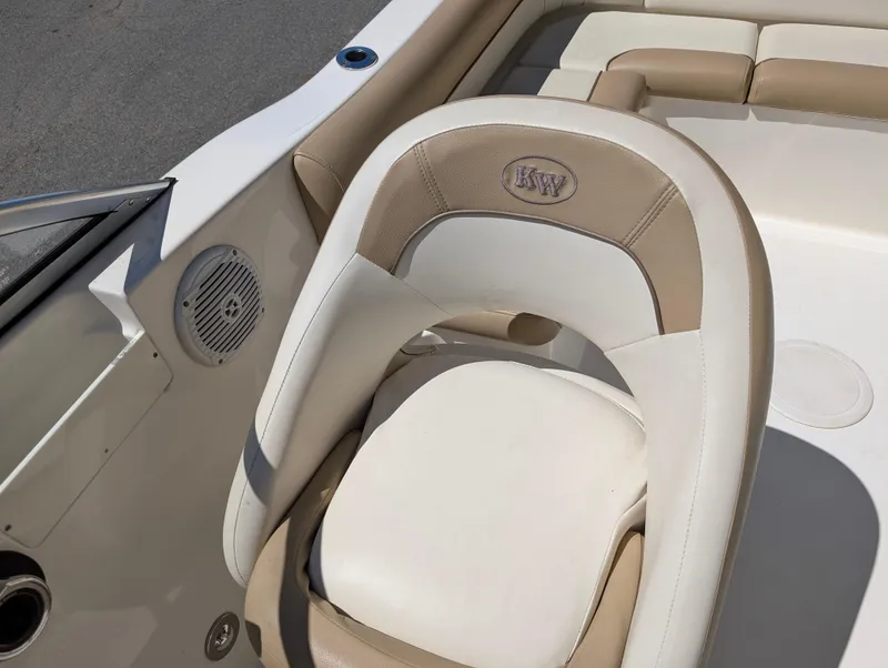 Slide: The Image of 2017 Key West 203 DFS boat interior with beige and white seating. - 14