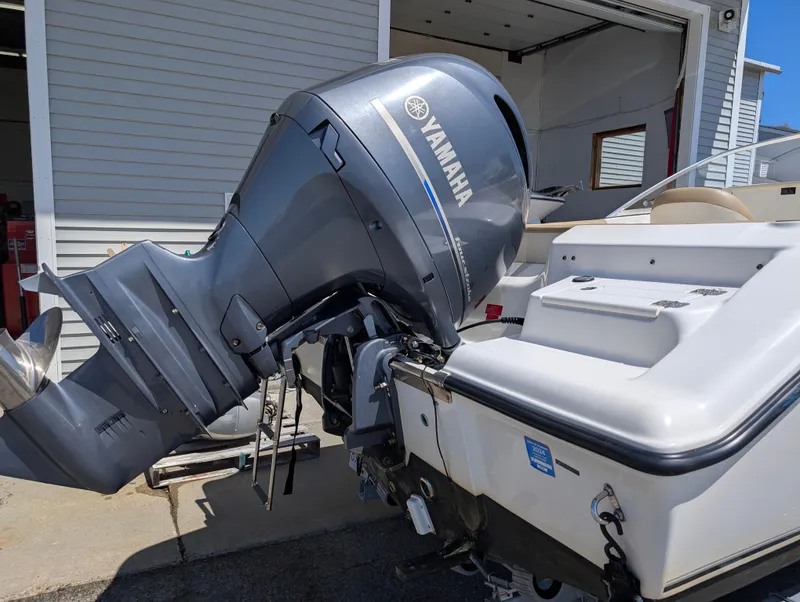 Slide: The Image of 2017 Key West 203 DFS boat with Yamaha outboard motor in a garage setting. - 19