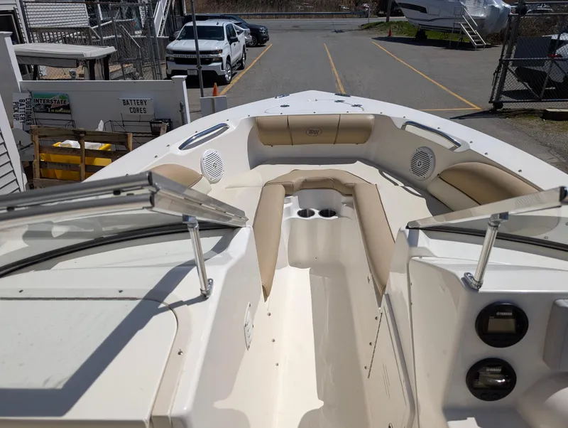 Slide: The Image of 2017 Key West 203 DFS boat interior with beige seating and windshield. - 6