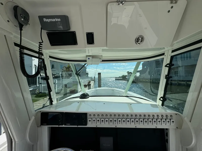 Slide: The Image of Interior view of 2011 Everglades 325 Center Console boat with Raymarine equipment. - 14