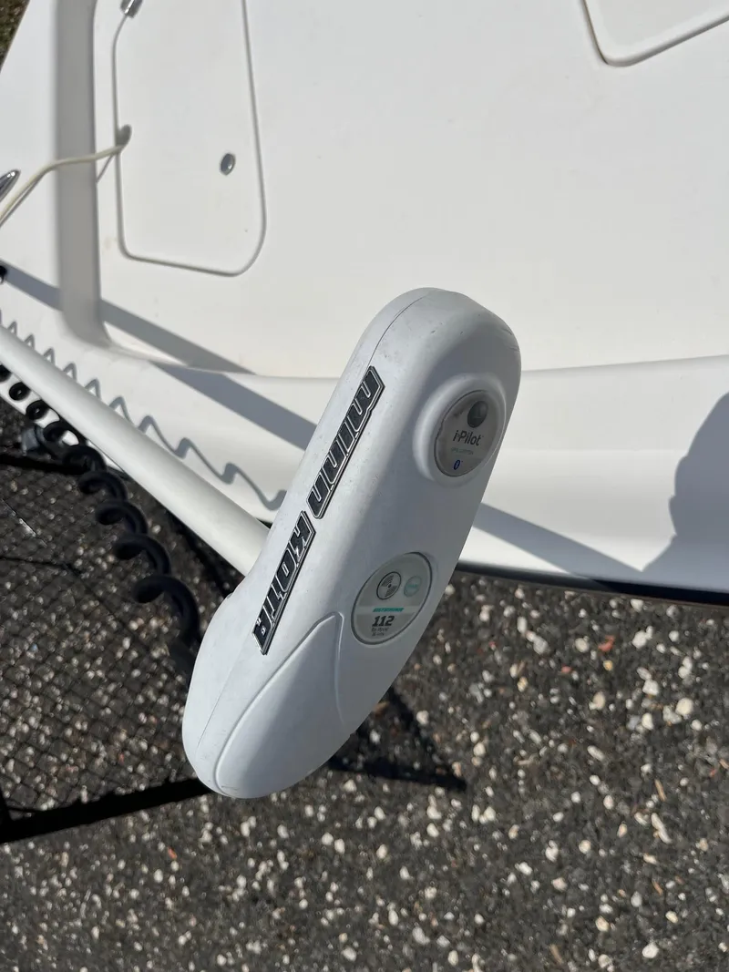 Slide: The Image of 2017 ShearWater 23LTZ boat trolling motor detail on textured surface. - 15