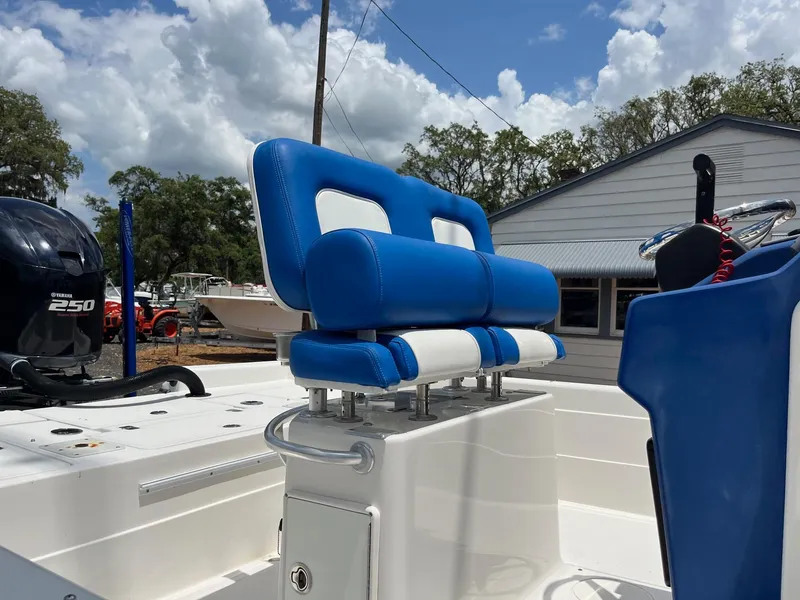 Slide: The Image of Blue and white seating on 2017 ShearWater 23LTZ boat, with Yamaha 250 engine. - 8