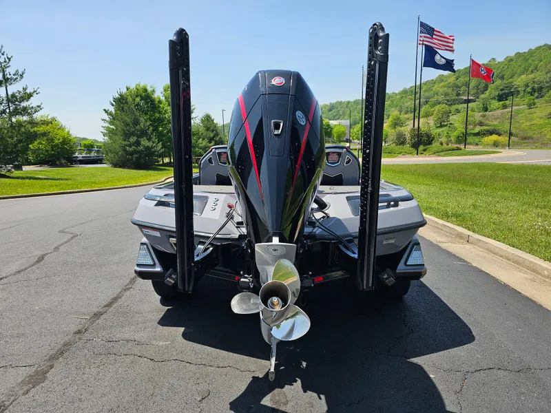 Slide: The Image of 2023 Ranger Z520R 55th Anniversary Limited Edition boat, rear view with flags in background. - 5