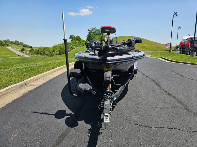 Slide: The Image of 2023 Ranger Z520R 55th Anniversary Limited Edition boat parked on asphalt under clear sky. - 8
