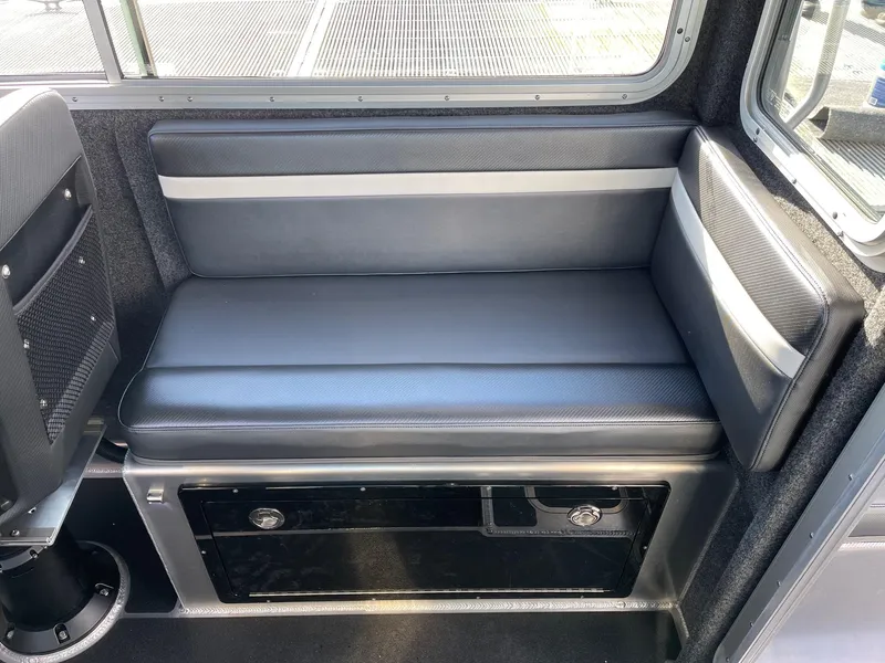 Slide: The Image of 2021 Life Proof 25 Full Cabin interior seating with storage compartment. - 18