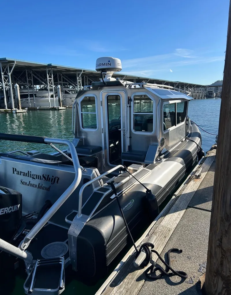 Slide: The Image of 2021 Life Proof 25 Full Cabin boat docked at marina under clear blue sky. - 41