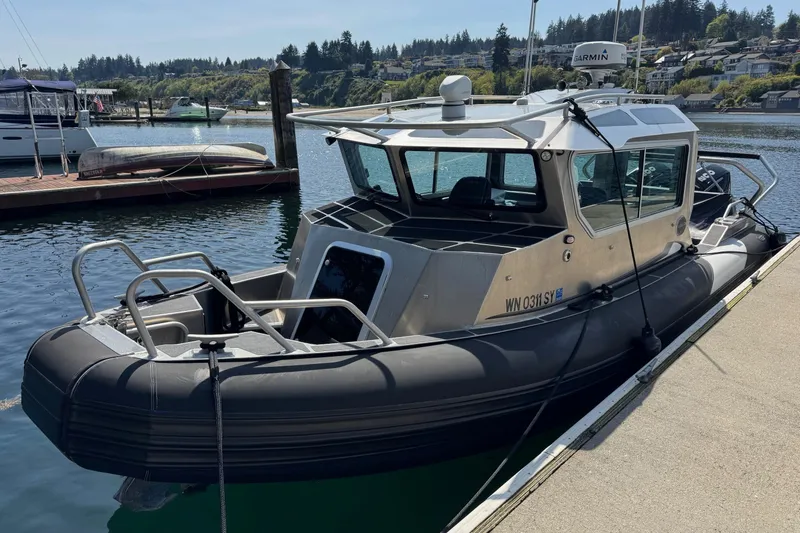 Slide: The Image of 2021 Life Proof 25 Full Cabin boat docked in a marina. - 44