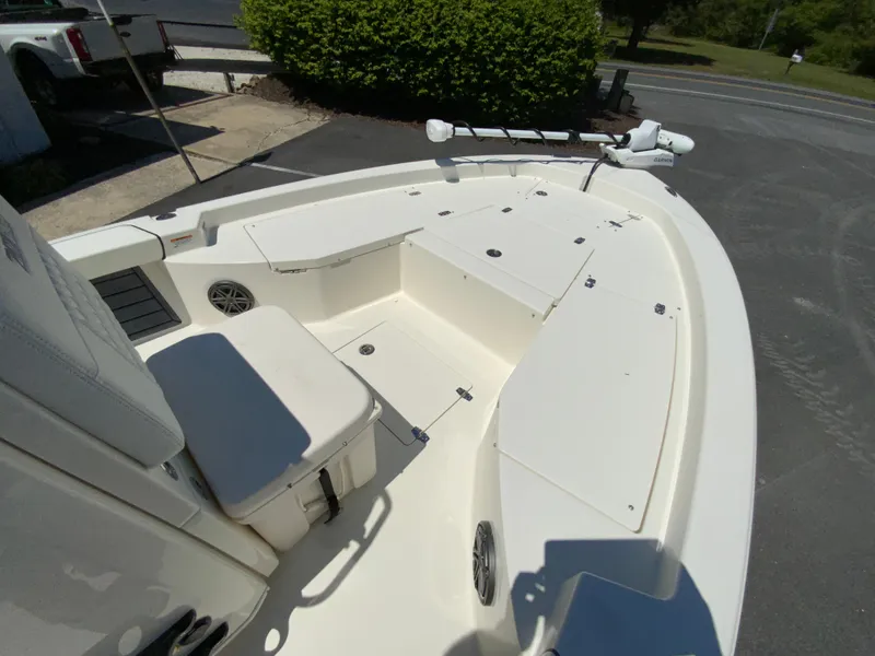 Slide: The Image of 2025 Pathfinder 2200 TRS boat interior with seating and storage compartments. - 24