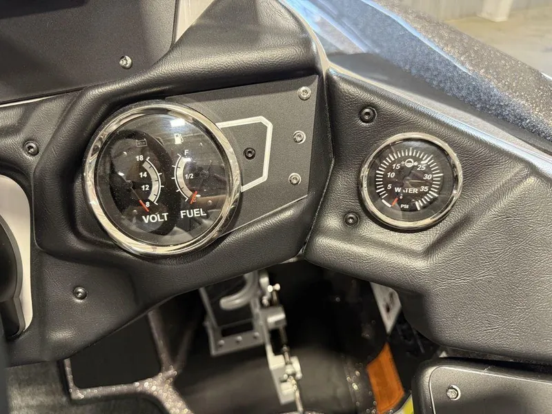 Slide: The Image of Dashboard of 2025 Skeeter ZXR19 with volt, fuel, and water temperature gauges. - 14