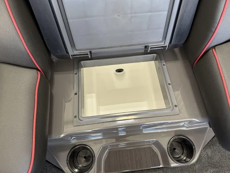 Slide: The Image of Interior of 2025 Skeeter ZXR19 boat with storage compartment and cup holders. - 13
