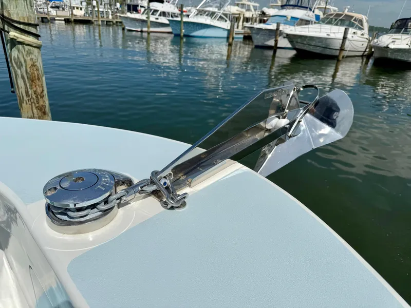 Slide: The Image of 2023 Millennium Marine NuWave 37 boat anchor system at marina dock. - 18