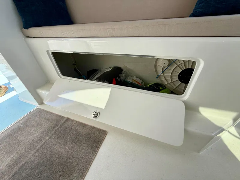Slide: The Image of Storage compartment on 2023 Millennium Marine NuWave 37 boat interior. - 28