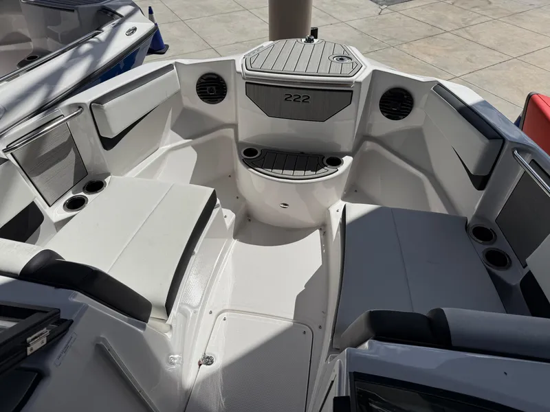 Slide: The Image of 2025 Yamaha Boats 222SD interior, featuring spacious seating and modern design elements. - 10