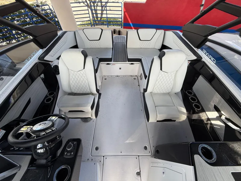 Slide: The Image of 2025 Yamaha Boats 222SD interior with modern seating and sleek design. - 5