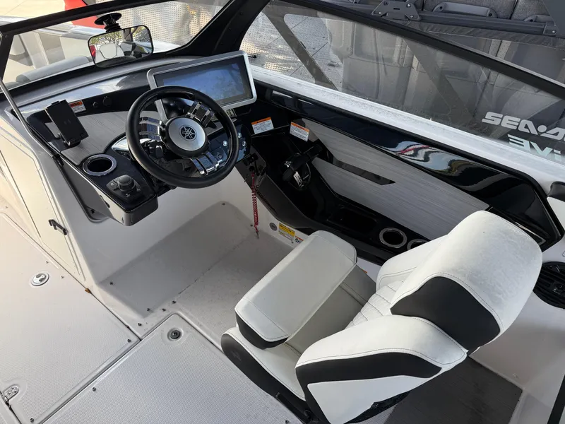 Slide: The Image of 2025 Yamaha Boats 222SD cockpit with modern steering and dashboard design. - 6