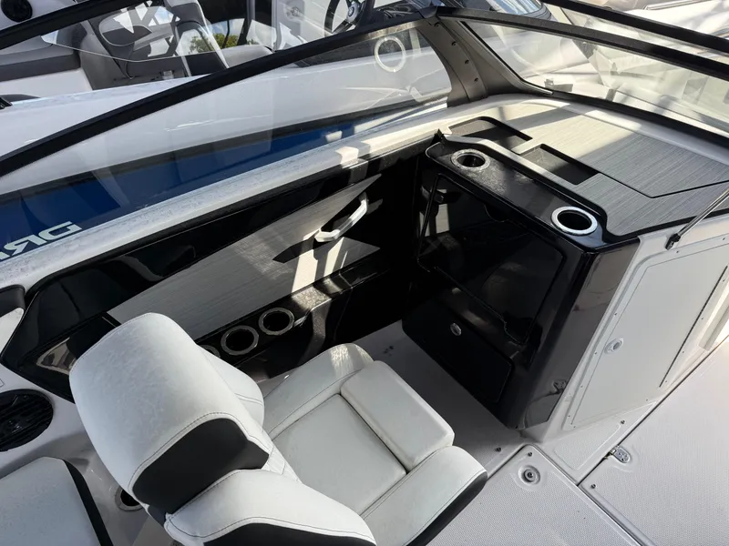 Slide: The Image of 2025 Yamaha Boats 222SD interior with sleek seating and modern dashboard design. - 7