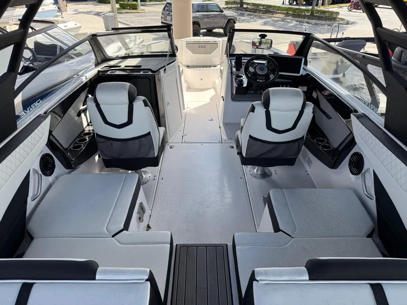 Slide: The Image of 2025 Yamaha Boats 222SD interior, featuring modern seating and sleek design. - 8