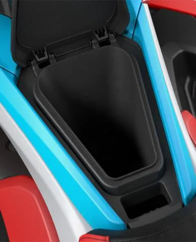Slide: The Image of 2025 Yamaha WaveRunner Jetblaster storage compartment, open lid, vibrant blue and red accents. - 6