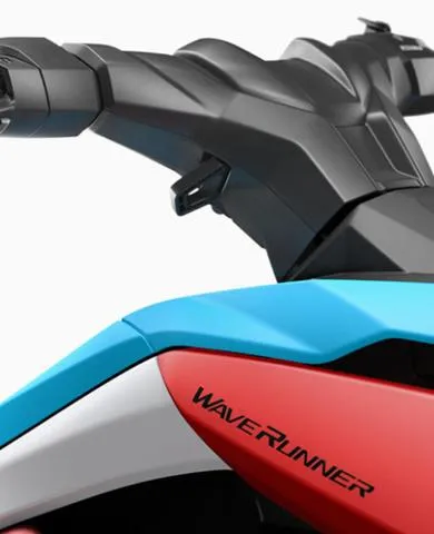 Slide: The Image of 2025 Yamaha WaveRunner Jetblaster, close-up of handlebars and colorful body design. - 7