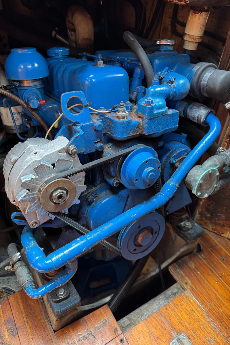 Slide: The Image of Blue engine of a 1979 Cheoy Lee Bill Luders Clipper Ketch sailboat. - 12